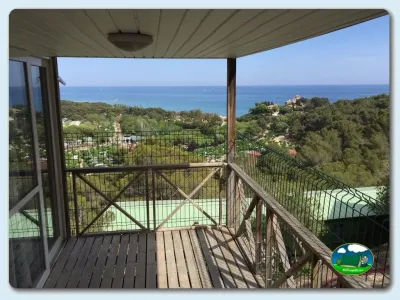 Bungalow con vistas al mar y sierra del Camping Trillas Platja Tamarit, Tamarit (Tarragona)