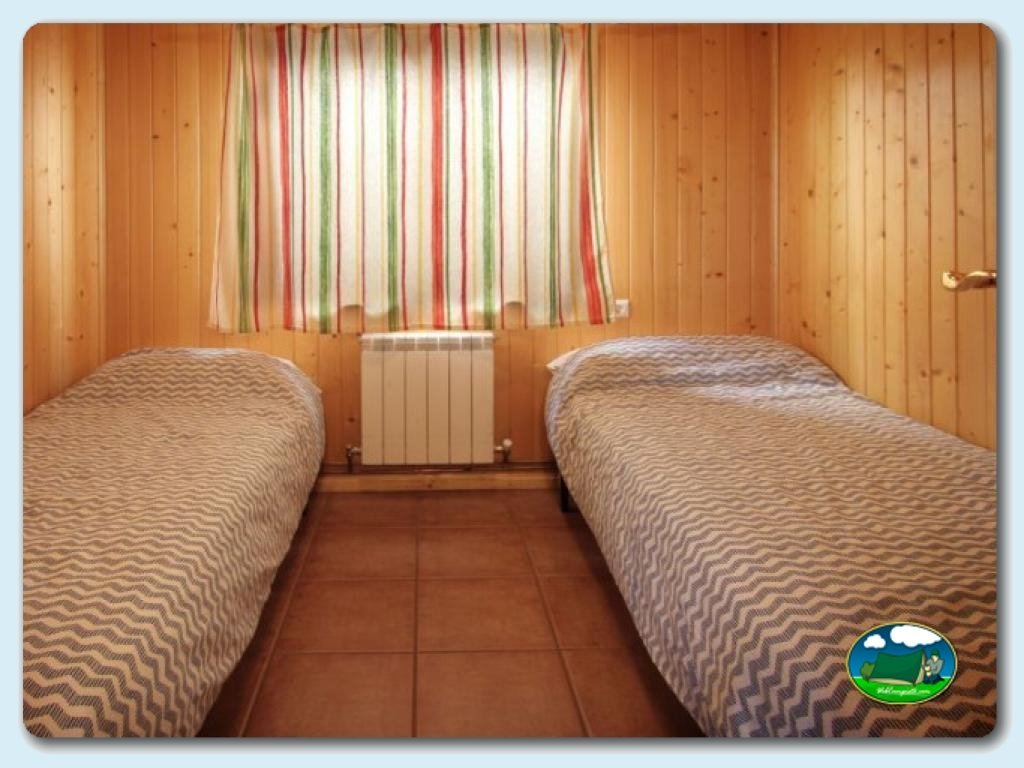 Bungalow Abubilla en Camping Lago Barasona, Huesca, España