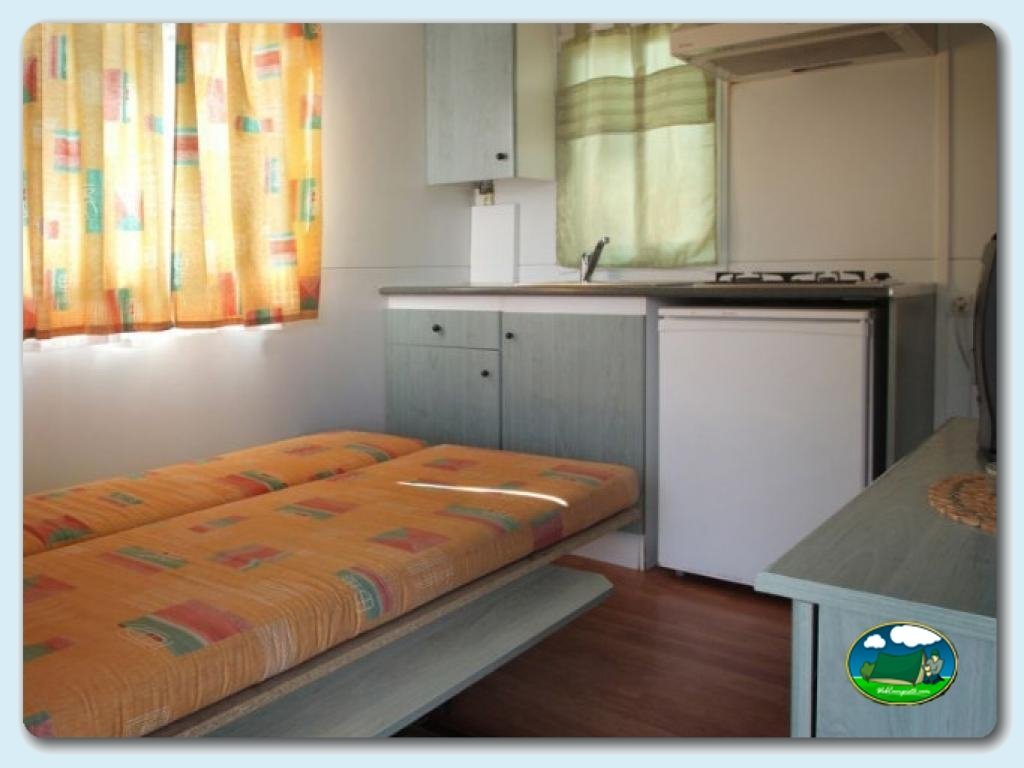Mobilhome Herrerillo en Camping Lago Barasona, Huesca, España