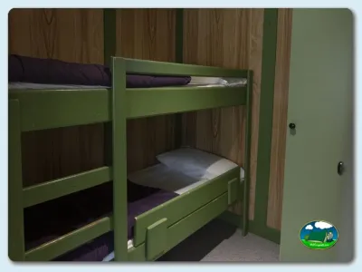 Cabaña con literas dobles verdes del Camping El Solsonés, Solsona (Lleida)