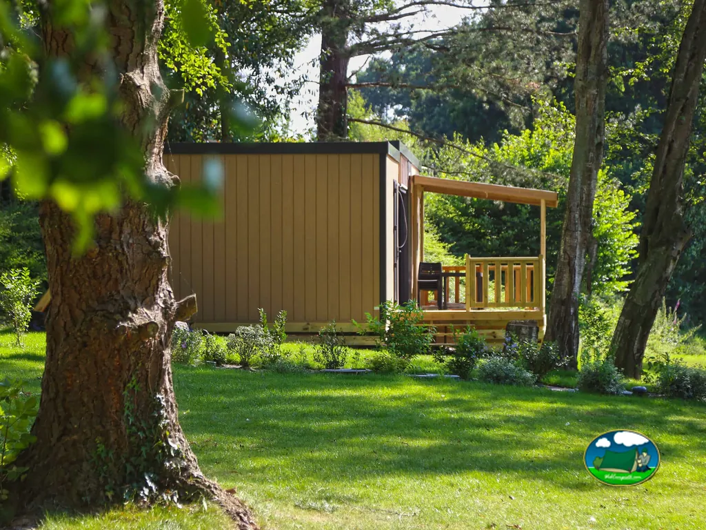 Bungalow entre árboles del Camping L'Escapade, CAHAGNOLLES (Calvados)
