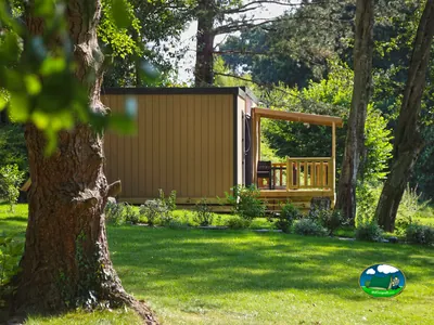 Bungalow entre árboles del Camping L'Escapade, CAHAGNOLLES (Calvados)