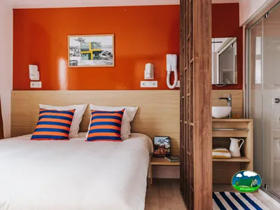 Dormitorio con baño