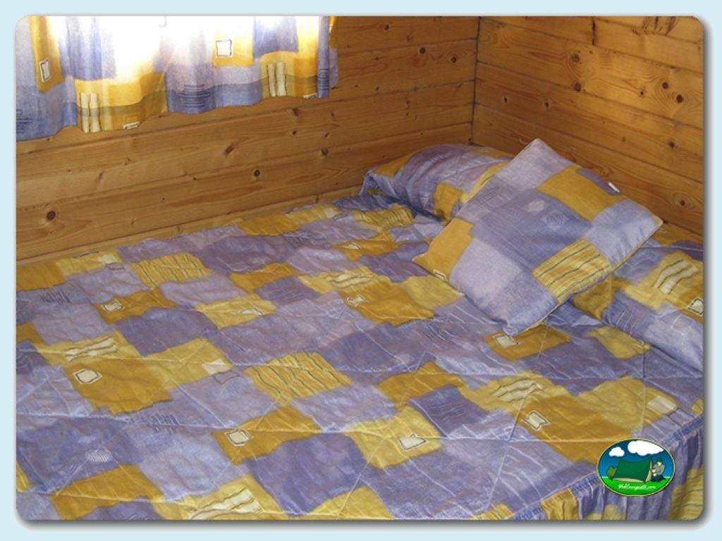Casita de madera con WC en Camping L`Alqueria, Valencia, España