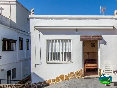 Mobil-home con entrada y ventana del Camping San Vicente, Xeraco (Valencia)